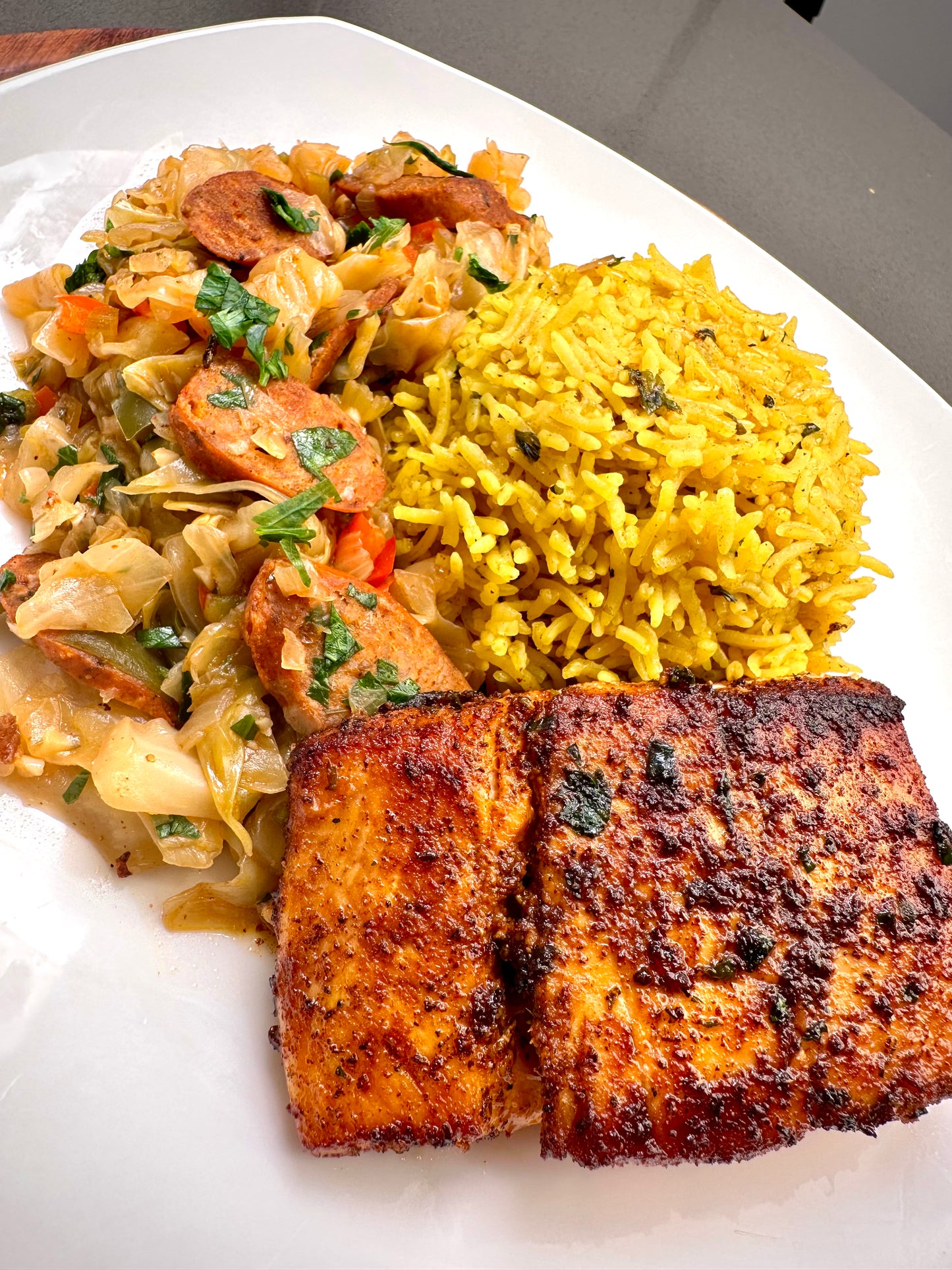 Smothered Cabbage, Yellow Rice, and Blackened Halibut